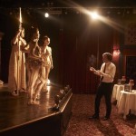 Steve Coogan as Paul Raymond, instructing the dancing girls