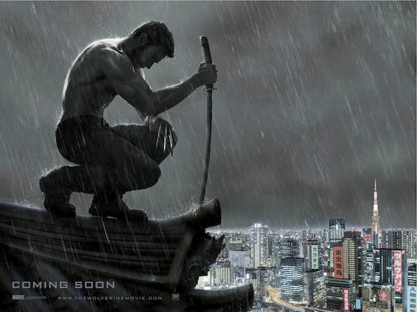 Logan looks out over Tokyo with samurai sword in The Wolverine