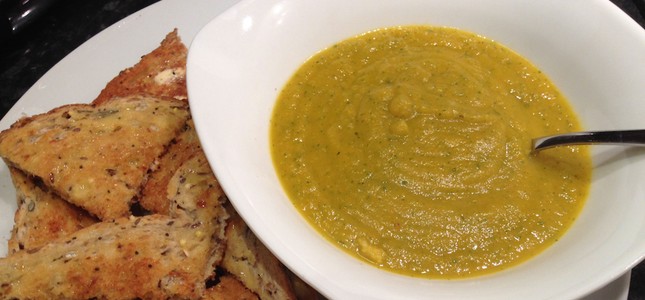 Carrot and coriander soup with toast slices